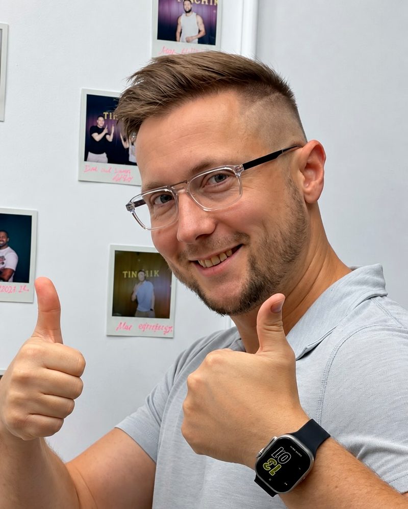 Client giving two thumbs up after his haircut at TinChik